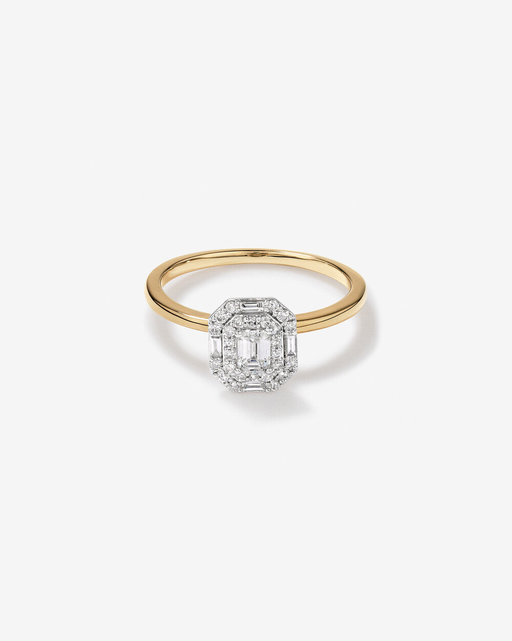 0.51 Carat TW Emerald Cut Diamond Baguette and Round Brilliant Halo Engagement Ring in 14kt Yellow and White Gold Revat Jewels