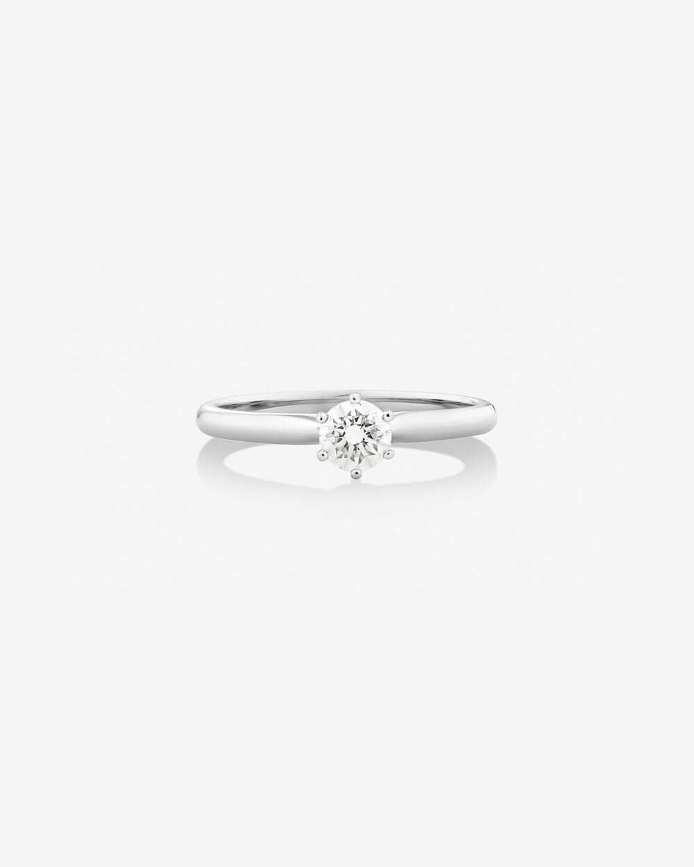 Solitaire Engagement Ring with a 0.34 Carat TW Diamond in 14kt White Gold Revat Jewels