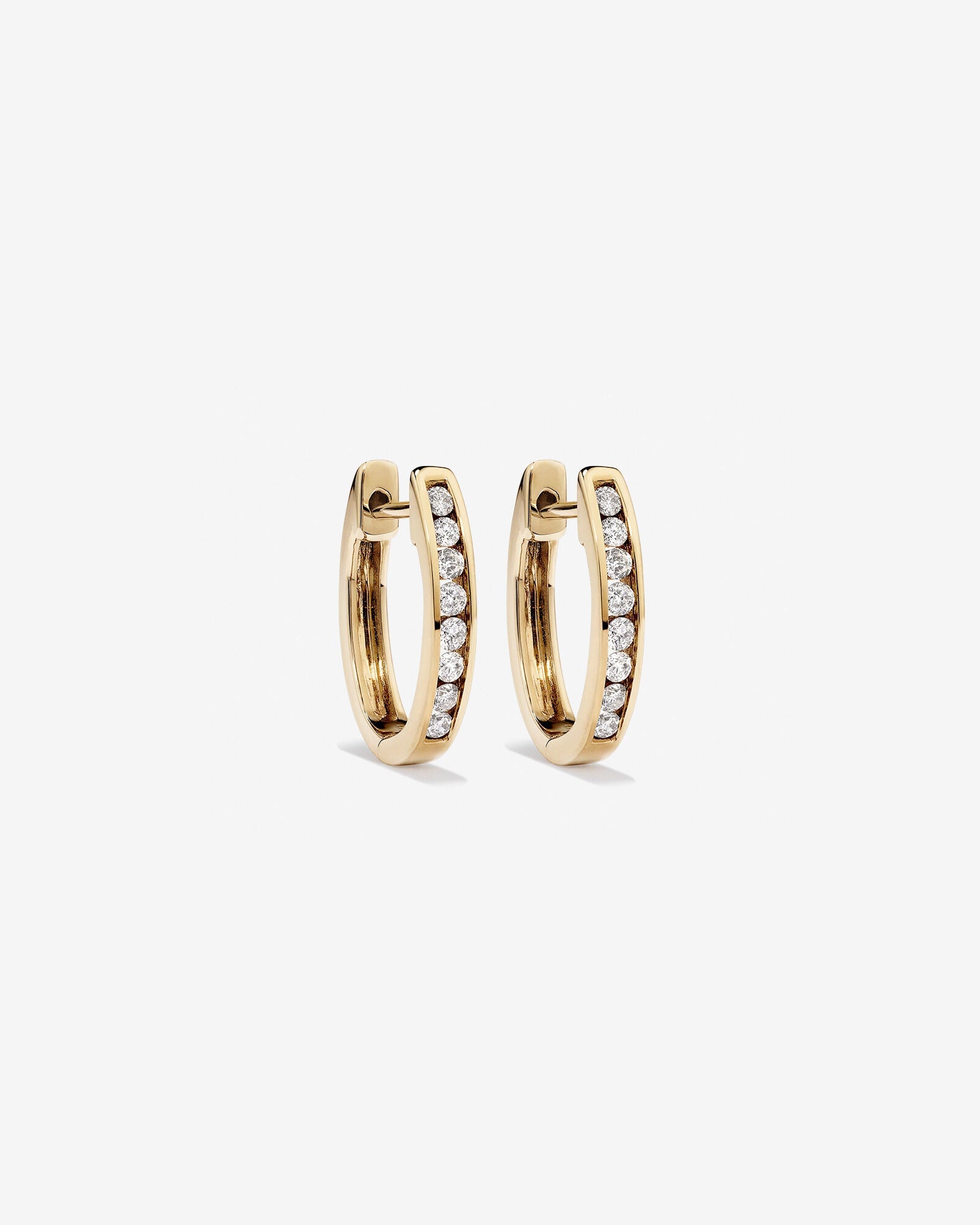 Huggie Earrings with 0.25 Carat TW of Diamonds in Yellow Gold Revat Jewels