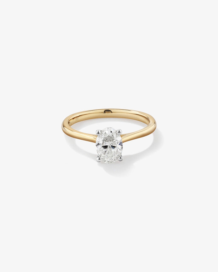 1.00 Carat TW Oval Solitaire Engagement Ring in 14kt Yellow and White Gold