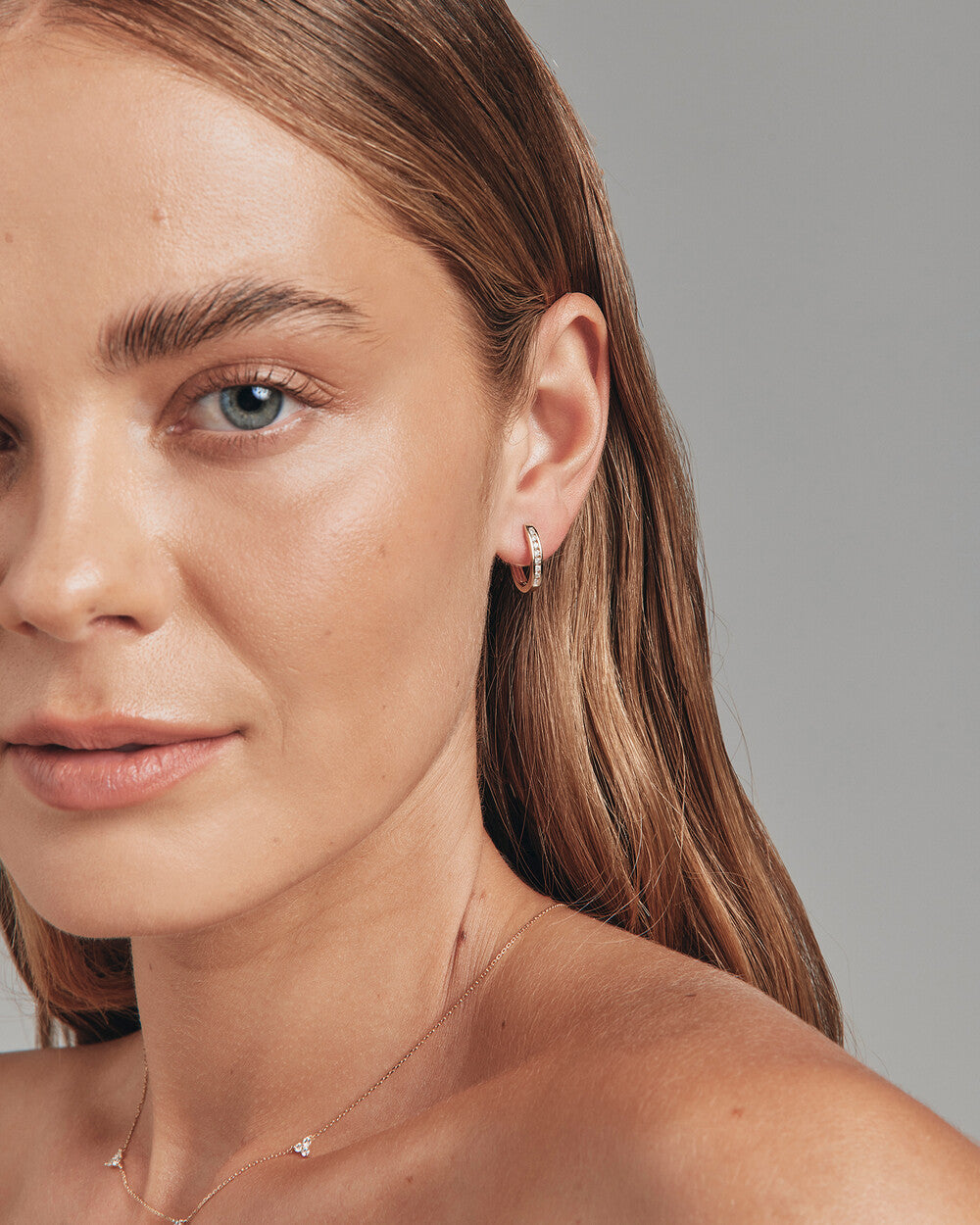 Huggie Earrings with 0.25 Carat TW of Diamonds in Yellow Gold Revat Jewels