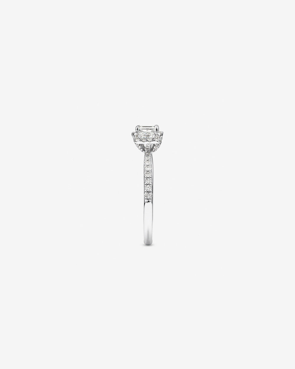 0.80 Carat TW Three Stone Emerald Cut Halo Engagement Ring in 14kt White Gold Revat Jewels