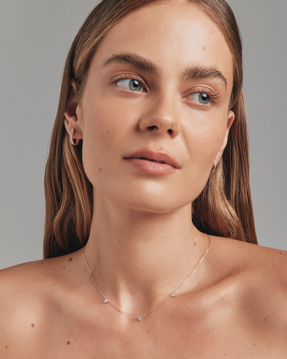 Huggie Earrings with 0.25 Carat TW of Diamonds in Yellow Gold Revat Jewels