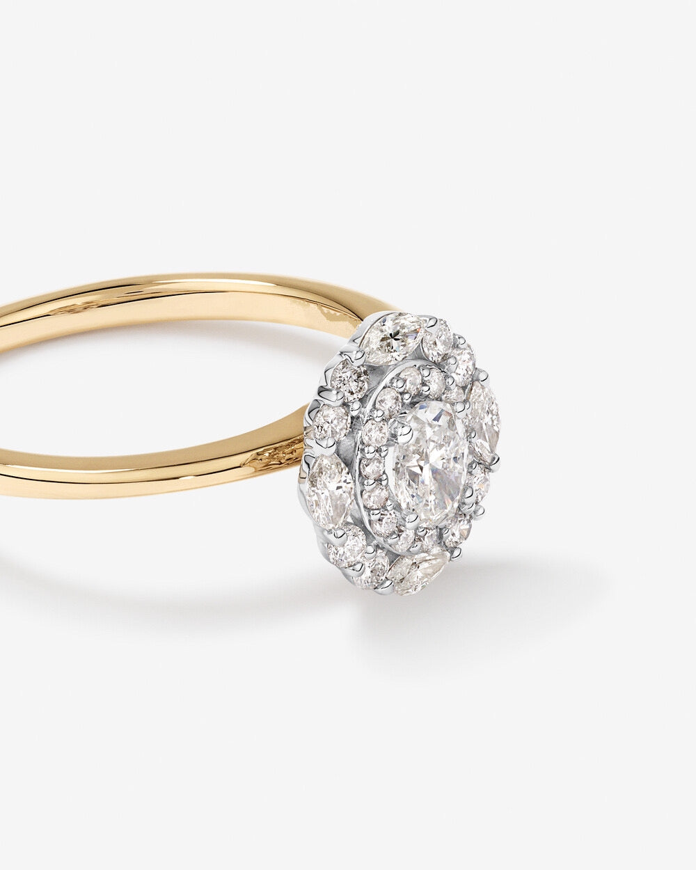 0.61 Carat TW Oval Cut Diamond Marquise and Round Brilliant Halo Engagement Ring in 14kt Yellow and White Gold Revat Jewels
