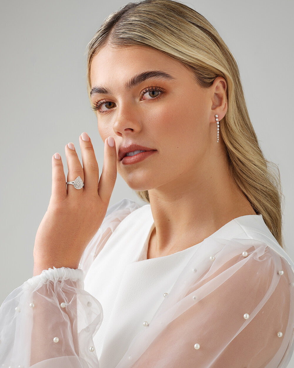 0.65 Carat TW Pear Cluster Halo Diamond Ring in 14kt White Gold Revat Jewels