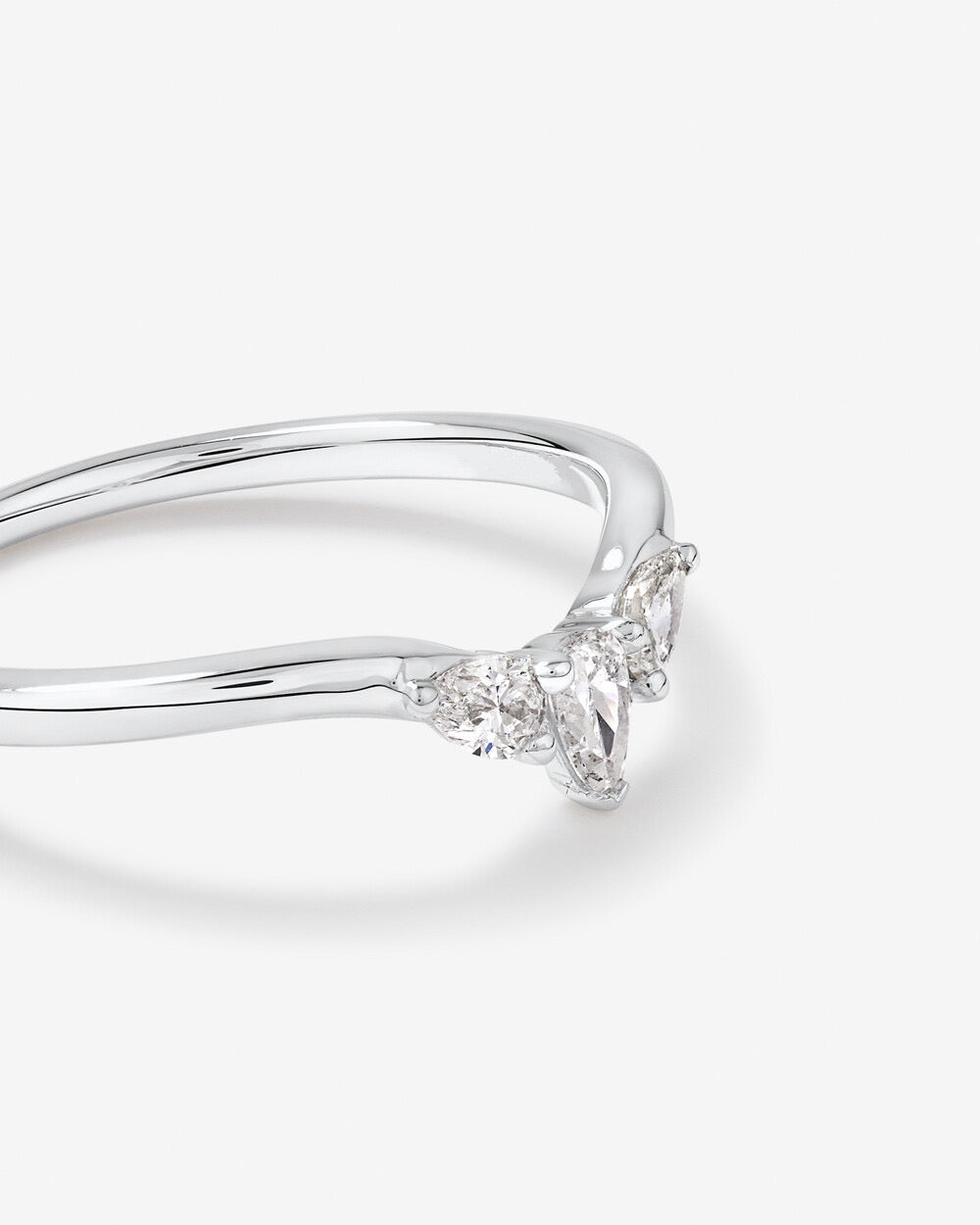 0.25 Carat TW Pear Diamond Curved Wedding Band in 14kt White Gold Revat Jewels