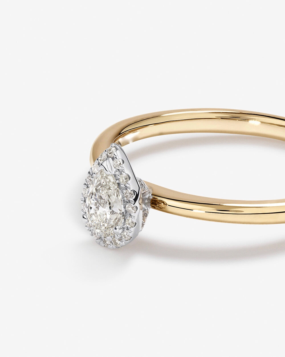 0.31 Carat TW Pear Cut Diamond Halo Engagement Ring in 14kt Yellow and White Gold Revat Jewels