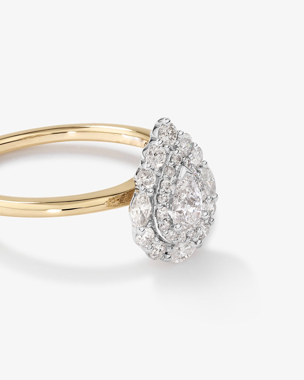 0.67 Carat TW Pear Cut Diamond Marquise and Round Brilliant Halo Engagement Ring in 14kt Yellow and White Gold Revat Jewels