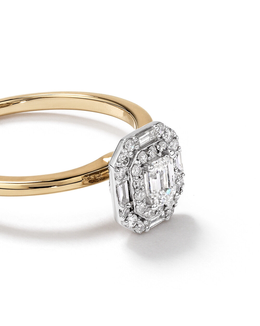 0.51 Carat TW Emerald Cut Diamond Baguette and Round Brilliant Halo Engagement Ring in 14kt Yellow and White Gold Revat Jewels
