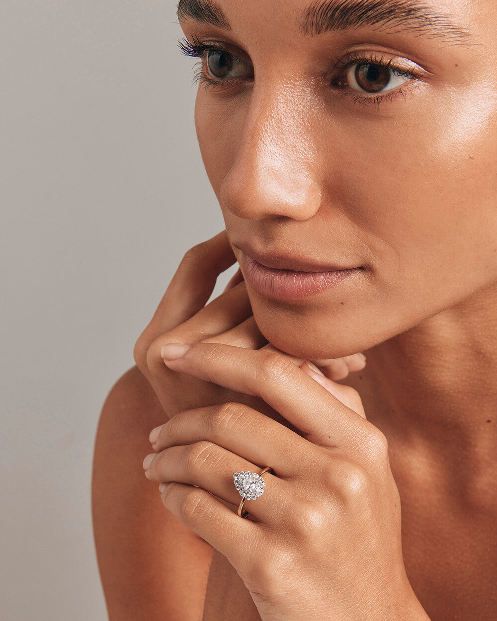 0.67 Carat TW Pear Cut Diamond Marquise and Round Brilliant Halo Engagement Ring in 14kt Yellow and White Gold Revat Jewels