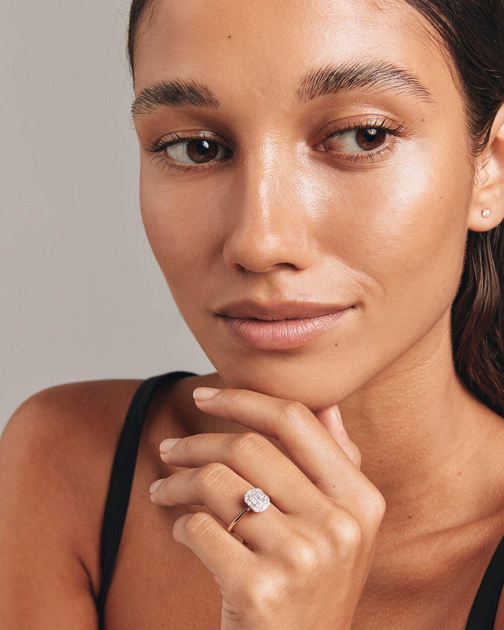 0.51 Carat TW Emerald Cut Diamond Baguette and Round Brilliant Halo Engagement Ring in 14kt Yellow and White Gold Revat Jewels